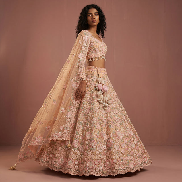 Soft yellow lehenga set with 3D floral applique, pink embroidery, V-neck blouse and skirt