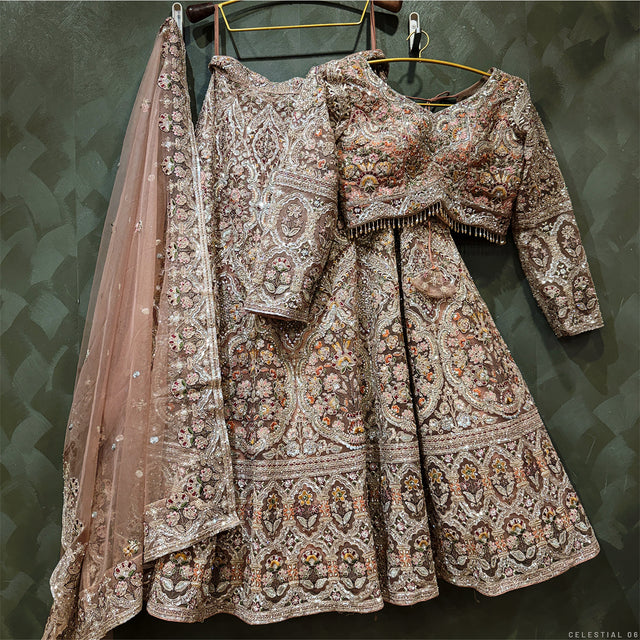 Embellished bridal lehenga set with multicolor threadwork, net dupatta, long sleeves