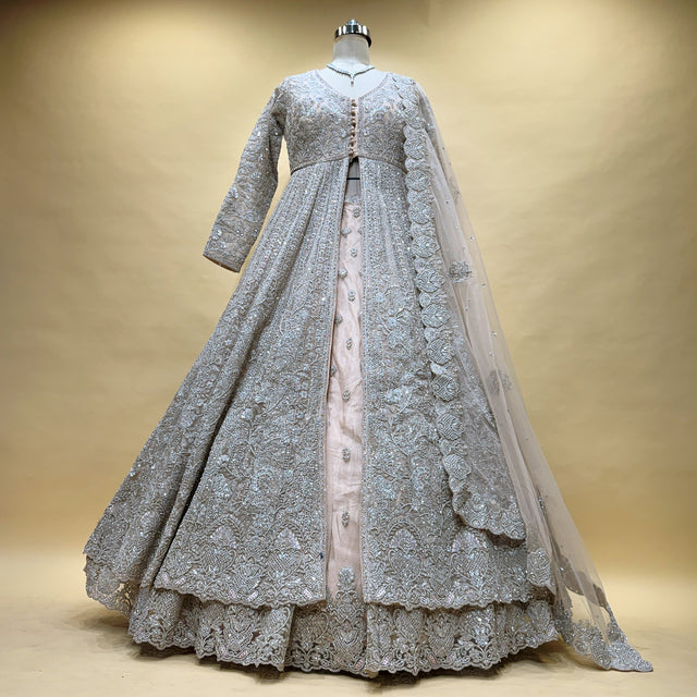 Bridal lehenga gown with silver zari net, flared hem, scalloped lace edges, sheer dupatta