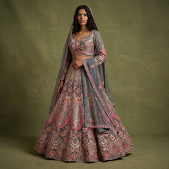Embroidered lehenga with floral motifs, pink accents on gray-blue base, with matching dupatta