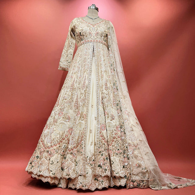 Ivory shimmer silk bridal gown with pearl bead lace and long sleeves