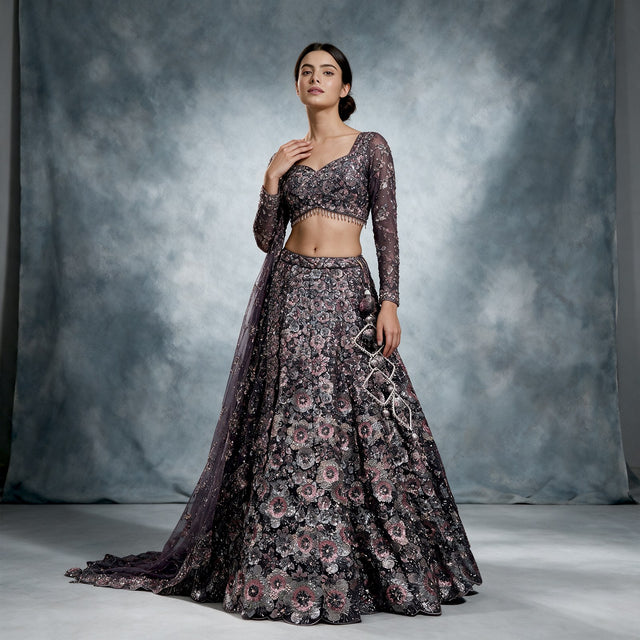 Wine sequin and stone work floral lehenga with full-sleeve blouse and net dupatta, worn
