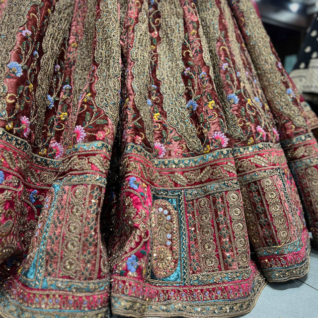 Multicolor embroidered lehenga skirt with ornate border and sequined detailing