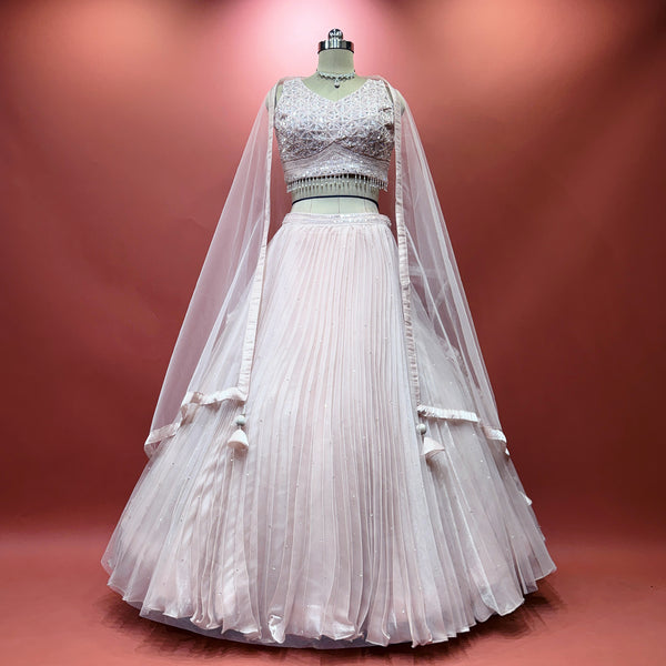 Baby pink organza lehenga with gathered skirt and matching tulle dupatta