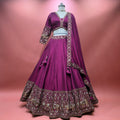 Wine purple lehenga with elephant motif yoke and ornate border embroidery
