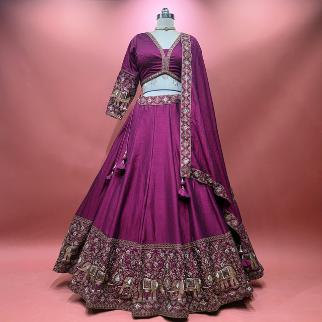 Wine purple lehenga with elephant motif yoke and ornate border embroidery