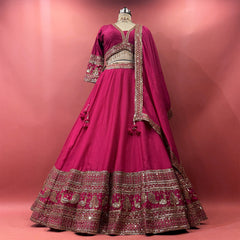 Rani pink ready-to-wear lehenga with zari and mirror border, full sleeves yoke