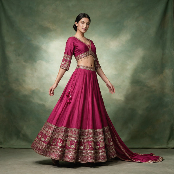Rani pink lehenga with zari-mirror borders and embroidered blouse, 3/4 sleeves