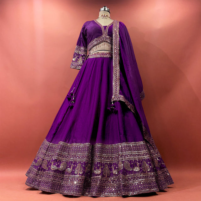 Purple ready-to-wear lehenga with zari and mirror trim at yoke, three-tier skirt