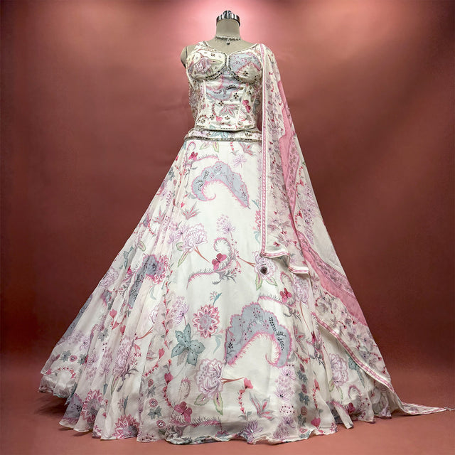 Off white printed silk corset lehenga set with dupatta on mannequin