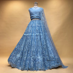 Blue net sequin floral lehenga with long sheer dupatta