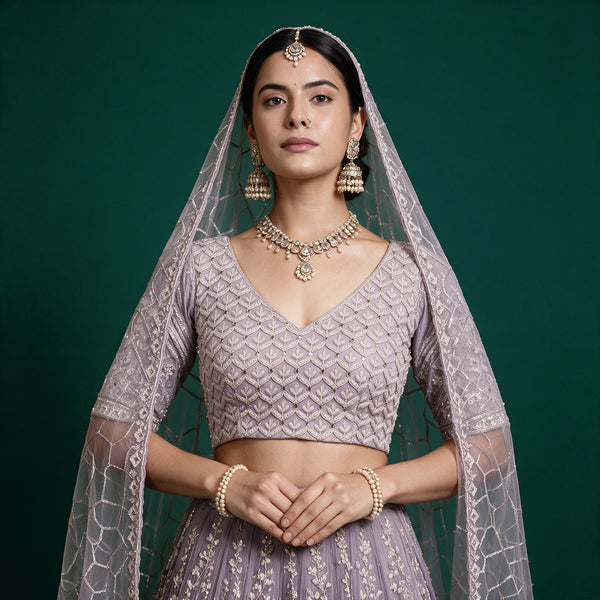 Lavender embroidered lehenga blouse with net dupatta, V-neck and decorative trim
