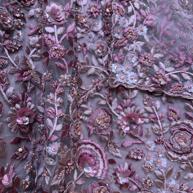 Lilac floral and paisley beadwork and threadwork on textured fabric