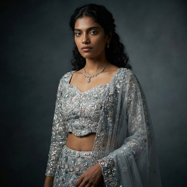 Silver floral embroidered lehenga with square-neck blouse and sheer dupatta