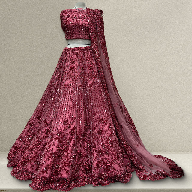 Maroon tone-on-tone floral handwork lehenga with fitted blouse and flared skirt