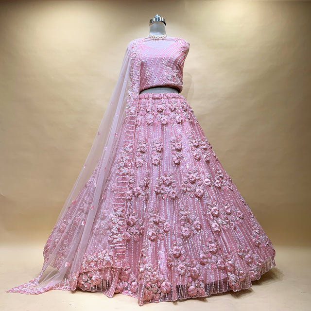 Pink net lehenga skirt with dense 3D floral embroidery and sheer drape dupatta