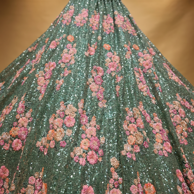 Teal green embellished skirt with dense pink, peach and gold floral sequin work