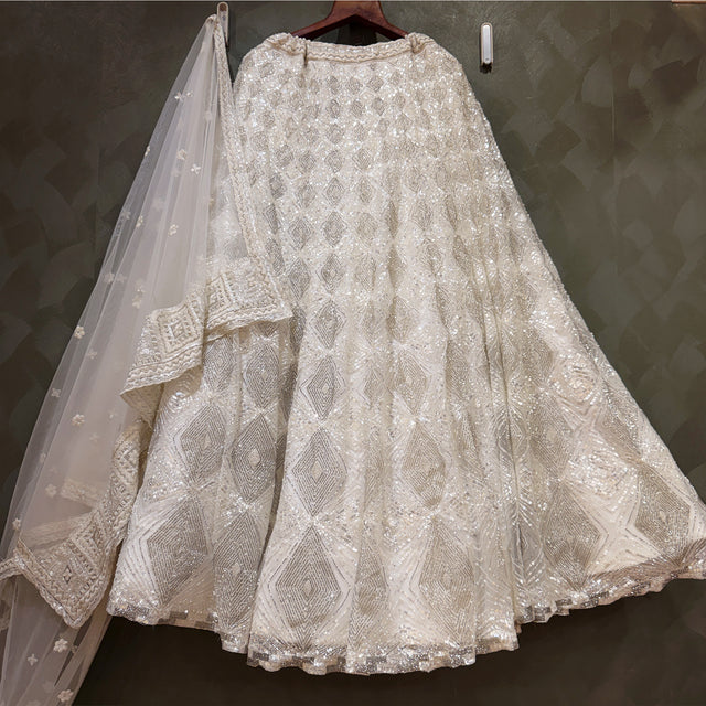 Off-white silver embellished lehenga skirt with sheer dupatta and border