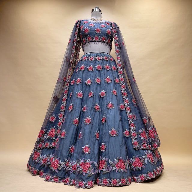 Embroidered grey lehenga with pink floral handwork and sheer cape dupatta