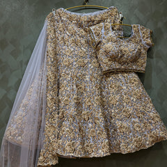 Lavender lehenga blouse and skirt with golden zari and beadwork, sheer dupatta