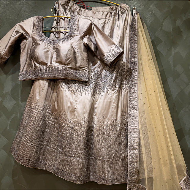 Silver moti-work blouse and flared lehenga skirt with check pattern, with dupatta