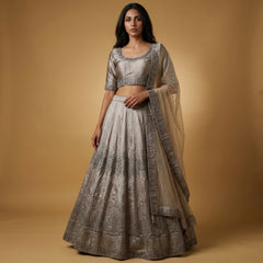 Silver silk lehenga with all-over moti bead work, flared skirt
