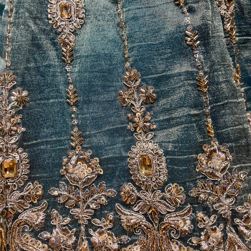 Teal lehenga fabric with ornate gold, silver and crystal beadwork and stone accents