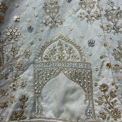 Dulhan in Ivory Lehenga Elegance: Celebrity-Inspired Royal Baggi Collection