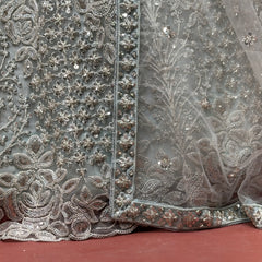Sky blue lehenga border with silver-toned floral beadwork and sequins