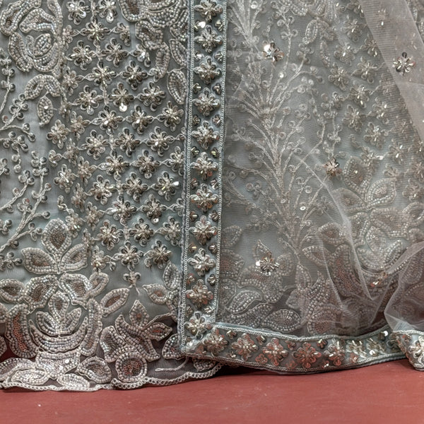 Sky blue lehenga border with silver-toned floral beadwork and sequins
