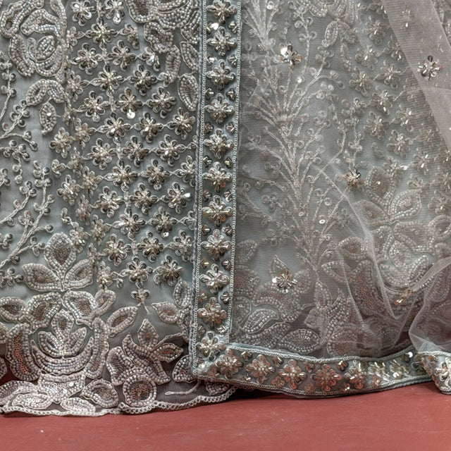 Sky blue lehenga border with silver-toned floral beadwork and sequins