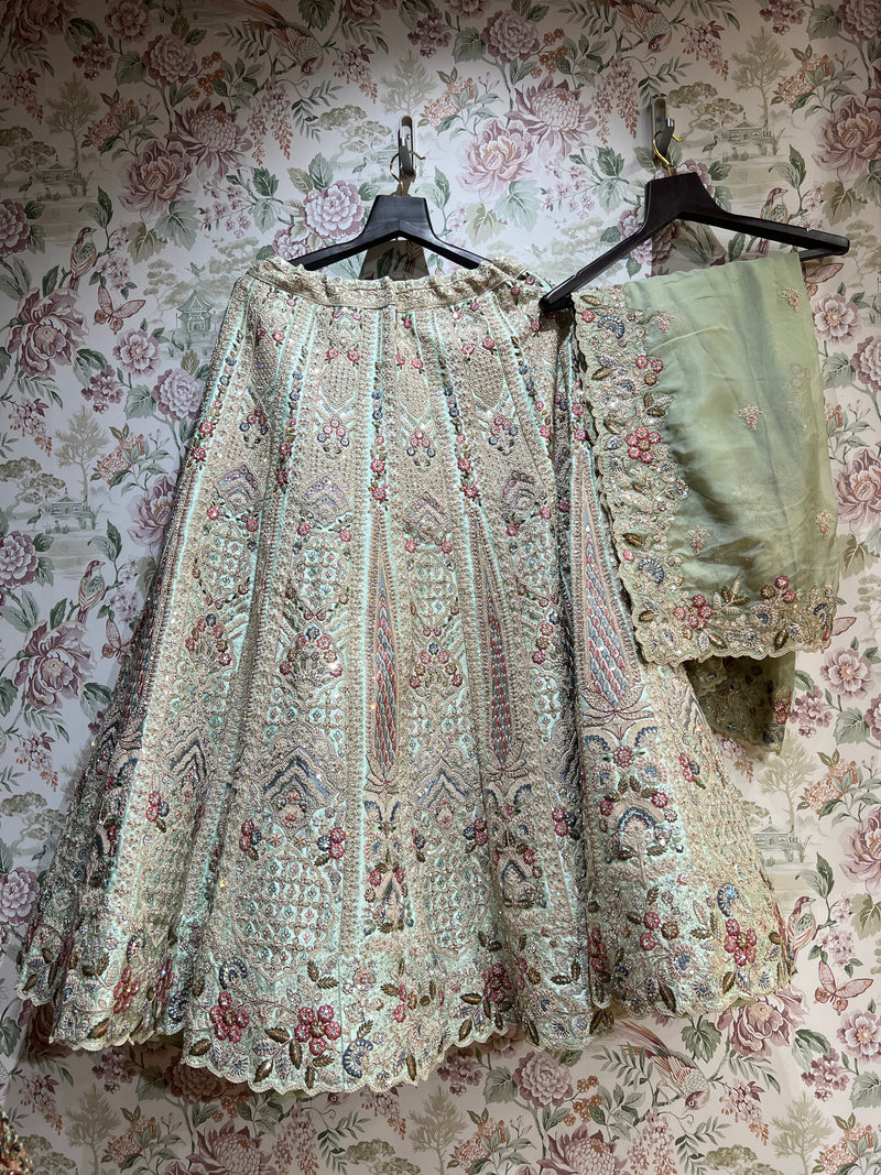 Embroidered bridal dress with sage dupatta overlay and scalloped hem, floral and beadwork