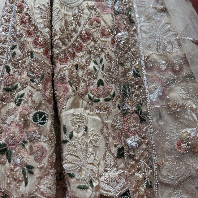 Ivory bead-embellished lace bodice with sparkling pearl details