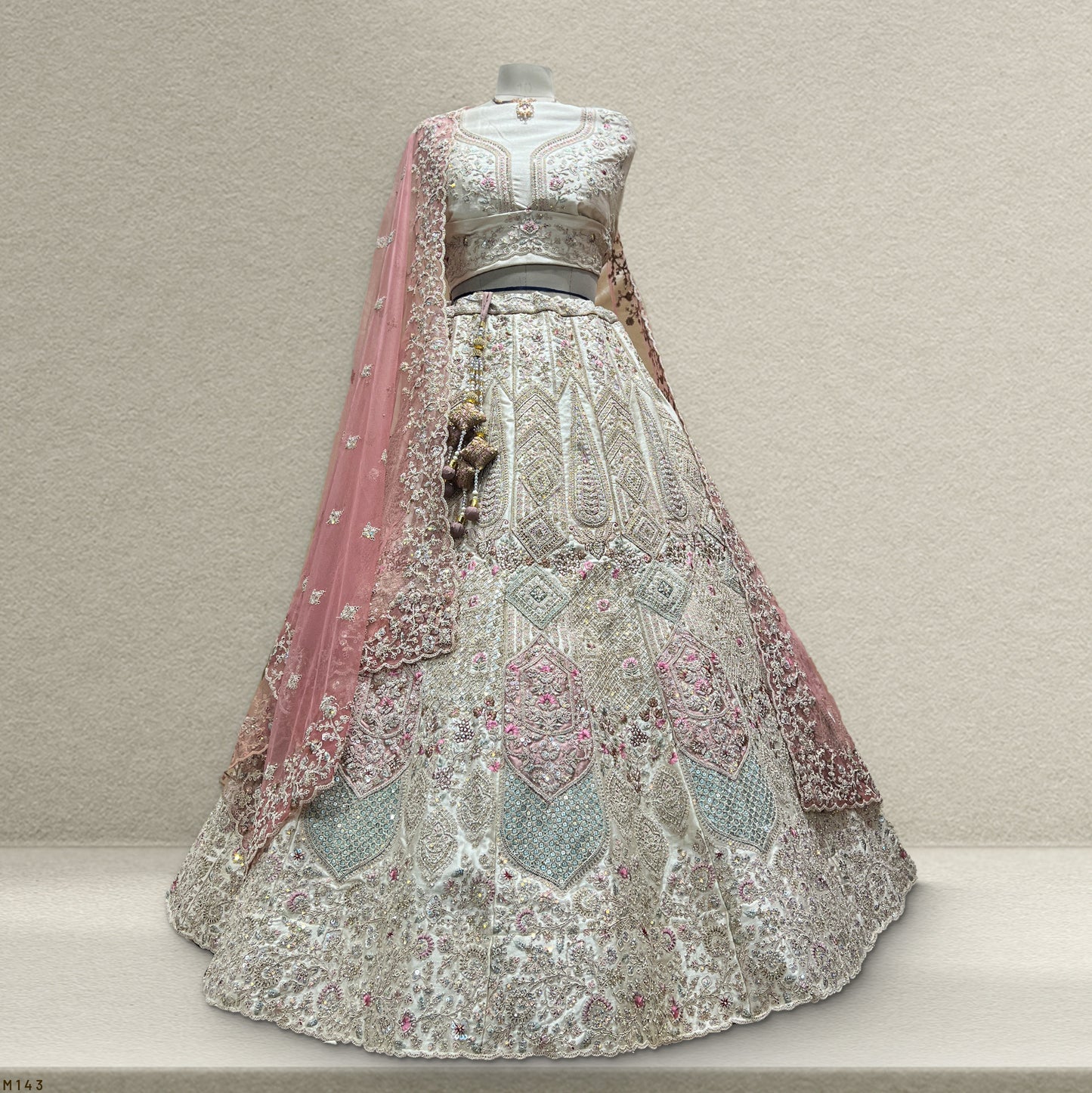 Rosé - Wedding Trousseau in Pastel Hues Off White Lehenga