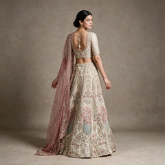 Damsel - Ivory Raw Silk Pastel Pink & Mint Embroidered Engagement Lehenga with Net Dupatta and Latkan