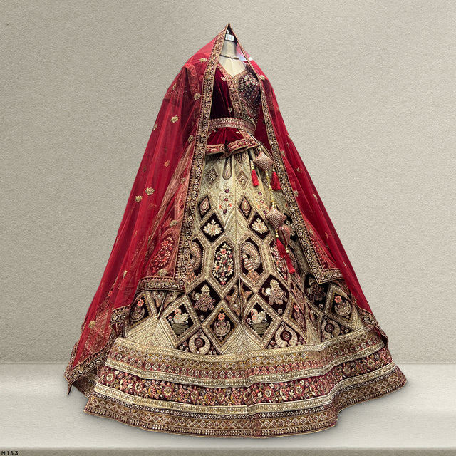 Velvet bridal lehenga with maroon dupatta, diamond motifs, and jeweled trim