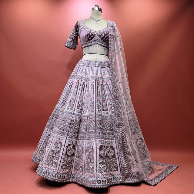 Lavender velvet designer lehenga with ornate printed yoke, flared skirt and matching dupatta