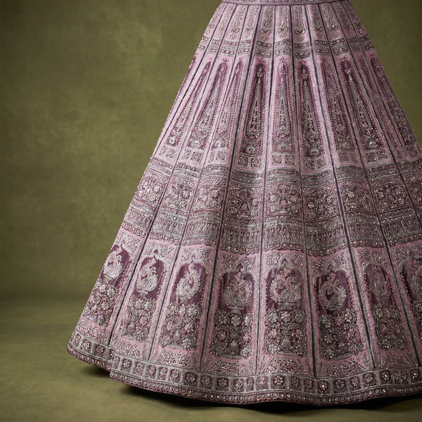 Lavender velvet lehenga skirt with repeating arch motifs and wide hem border