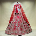 Red bridal lehenga with mirror work, zari peacock motifs and double dupatta