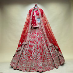 Red bridal lehenga with mirror work, zari peacock motifs and double dupatta