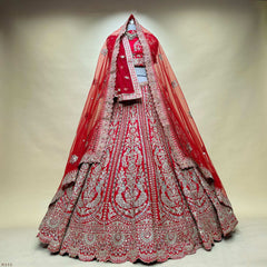 Red bridal lehenga with heavy silver embroidery border and long draped dupatta