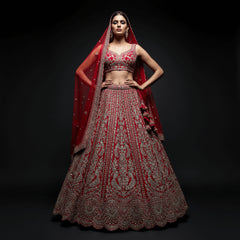 Red embroidered bridal lehenga with fitted blouse, flared skirt and double dupatta
