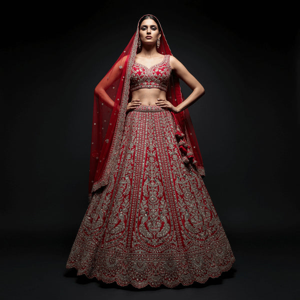 Red embroidered bridal lehenga with fitted blouse, flared skirt and double dupatta
