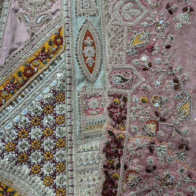 Embroidered pastel fabric swatches with mirror-work, floral motifs, and sequins