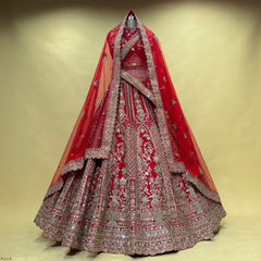 Red bridal lehenga with silver zari embroidery and double dupatta