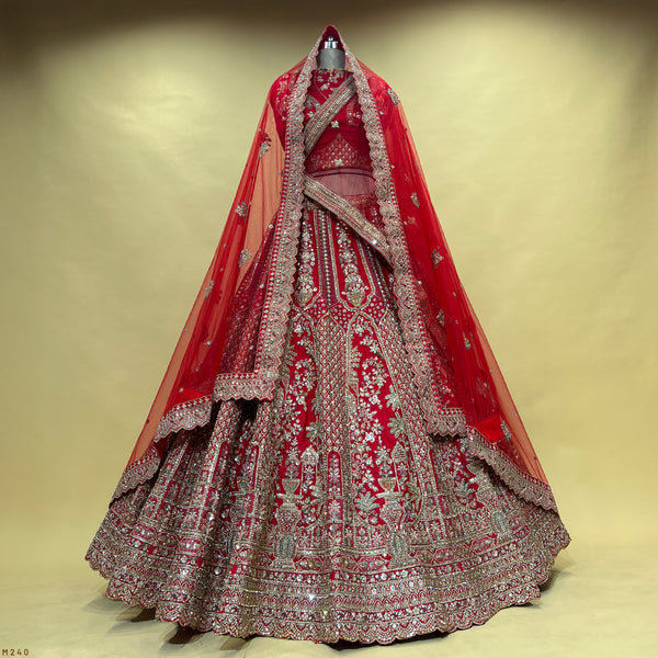 Red bridal lehenga with silver zari embroidery and double dupatta
