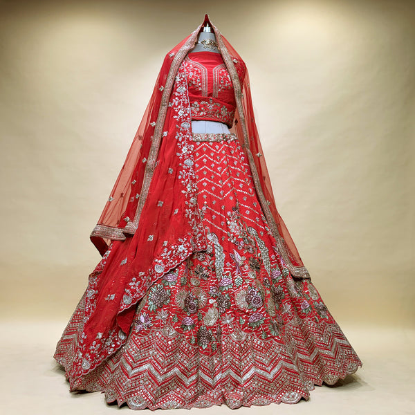 Scarlet red bridal lehenga with embroidered floral patterns and double dupatta
