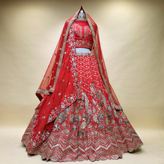 Scarlet red bridal lehenga with embroidered floral patterns and double dupatta