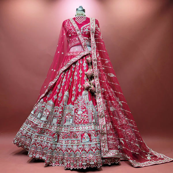 Pink bridal lehenga with silver-toned Jharoka embroidery and two draped dupattas