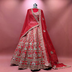 Red bridal lehenga with silver zari embroidery and double dupatta, ornate border hem